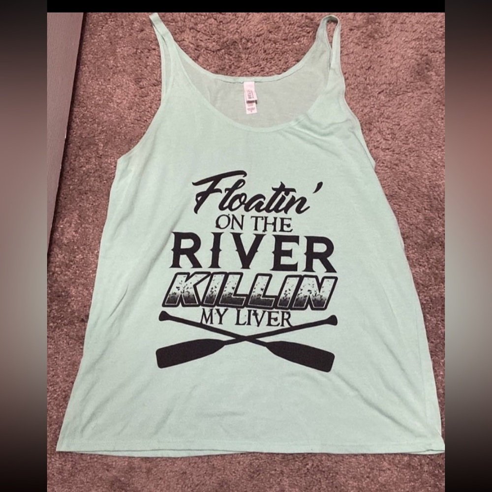 Floating on the river tank top
